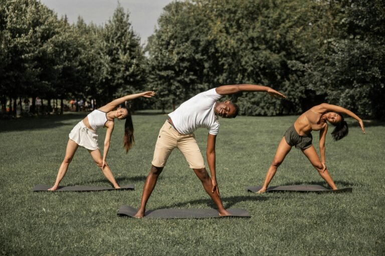 Group yoga session in a park